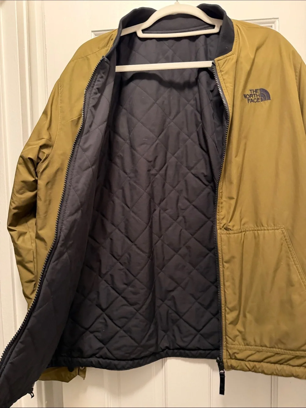 The North Face Men's reversible Black Bomber Jacket with Olive Interior M